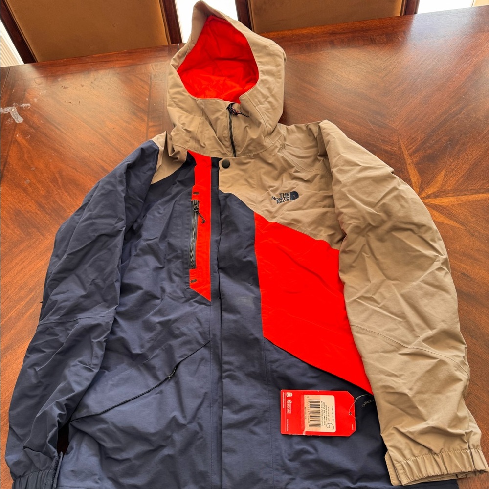 The North Face Men's Navy, Red, and Tan Raincoat